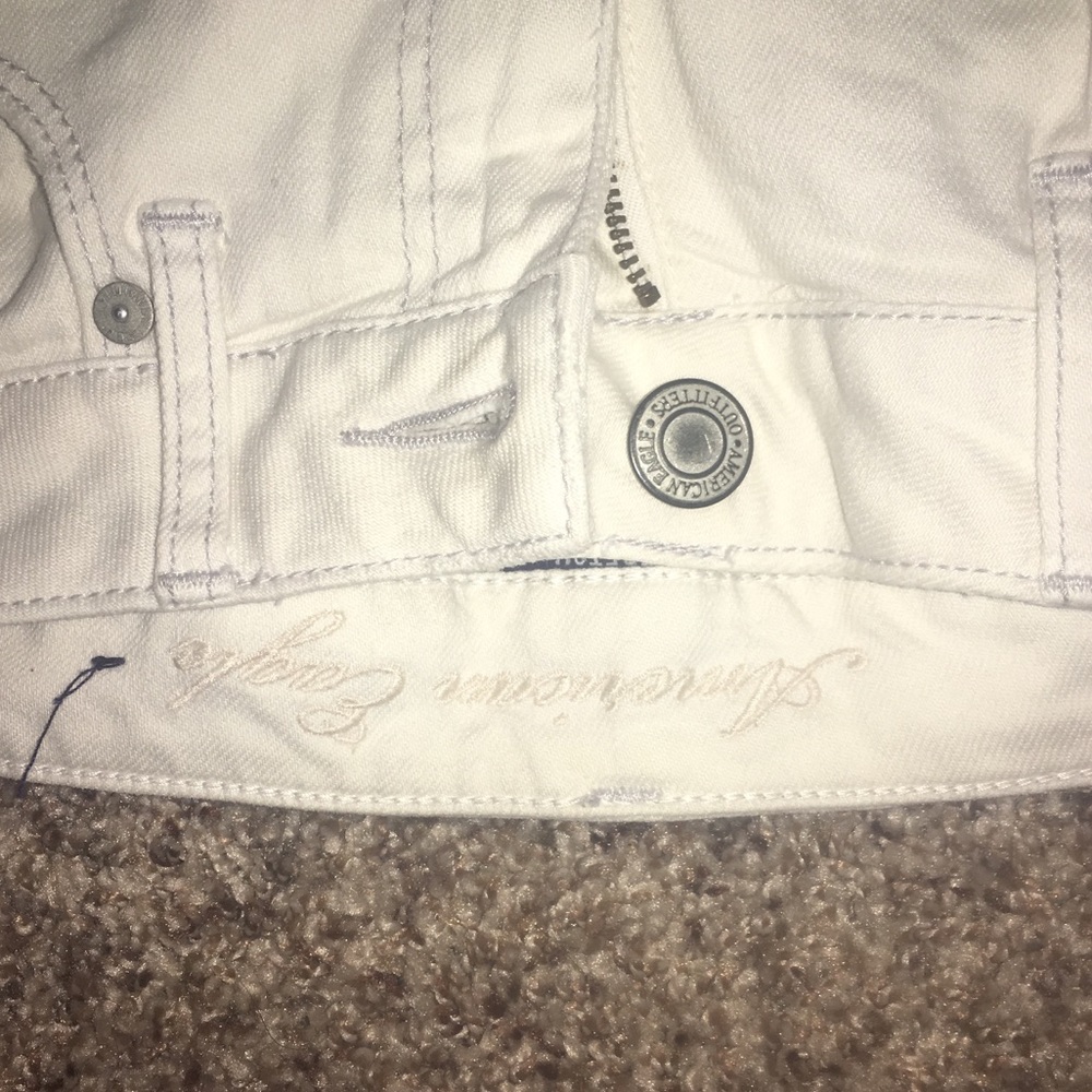 White ripped jeans